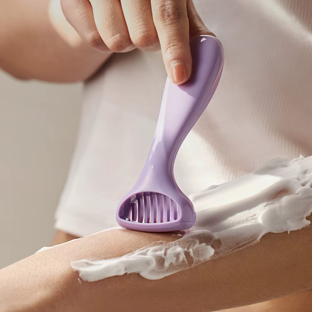 Rasoir manuel pour l'épilation des femmes