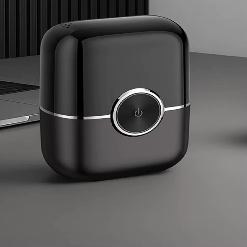 Mini rasoir électrique à aspiration magnétique