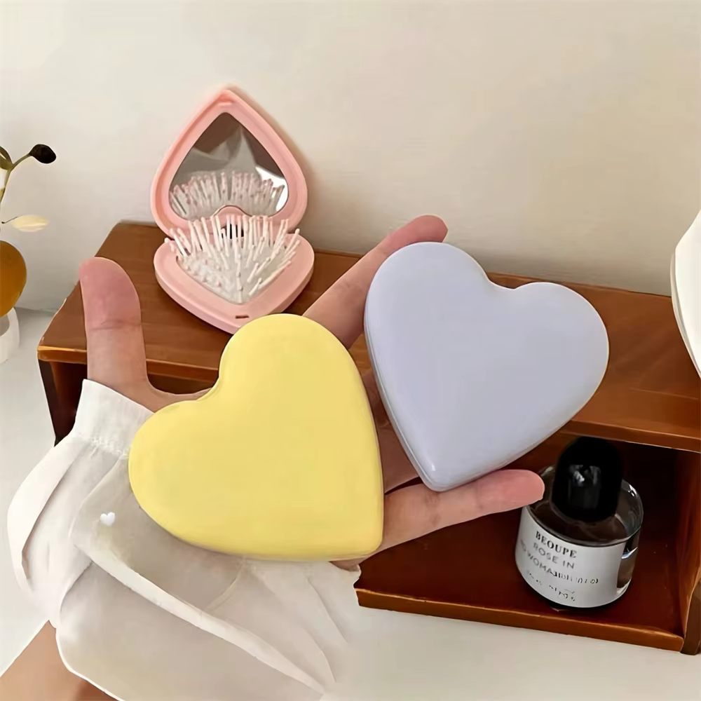 Brosse à cheveux en forme de cœur avec miroir 2 en 1